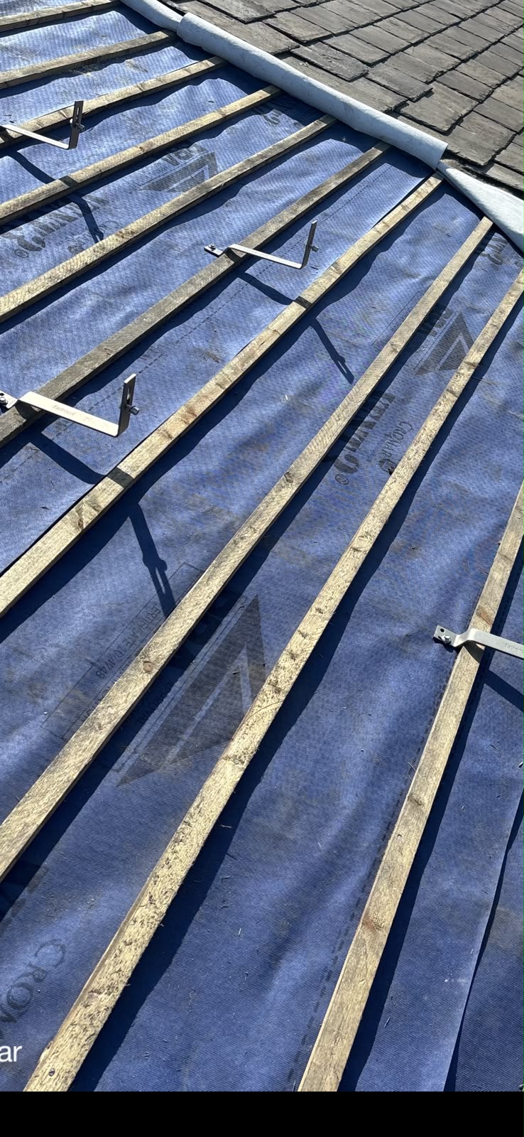 Reroof with solar brackets