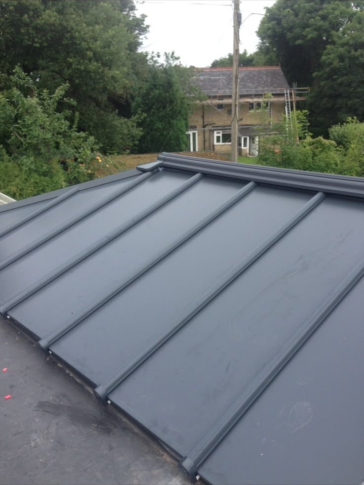 A finished standing-seam roof by JRD Roofing